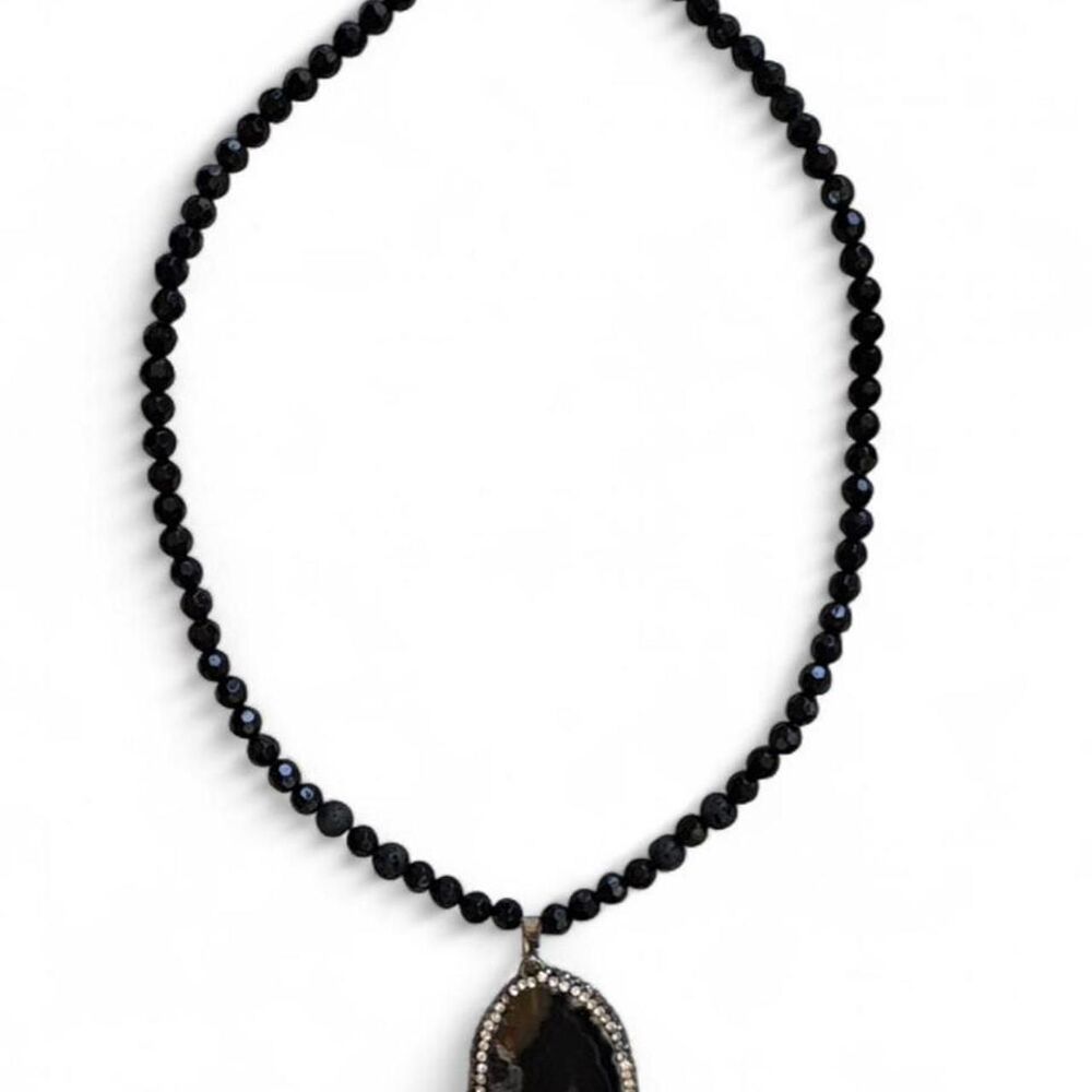 Black beaded boho necklace with large stone pendant
